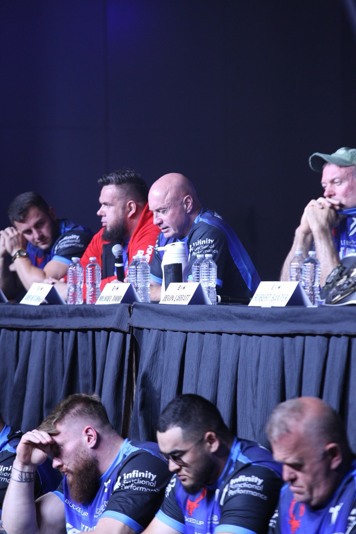East vs West 24: a competitor answers into the microphone at the press conference table